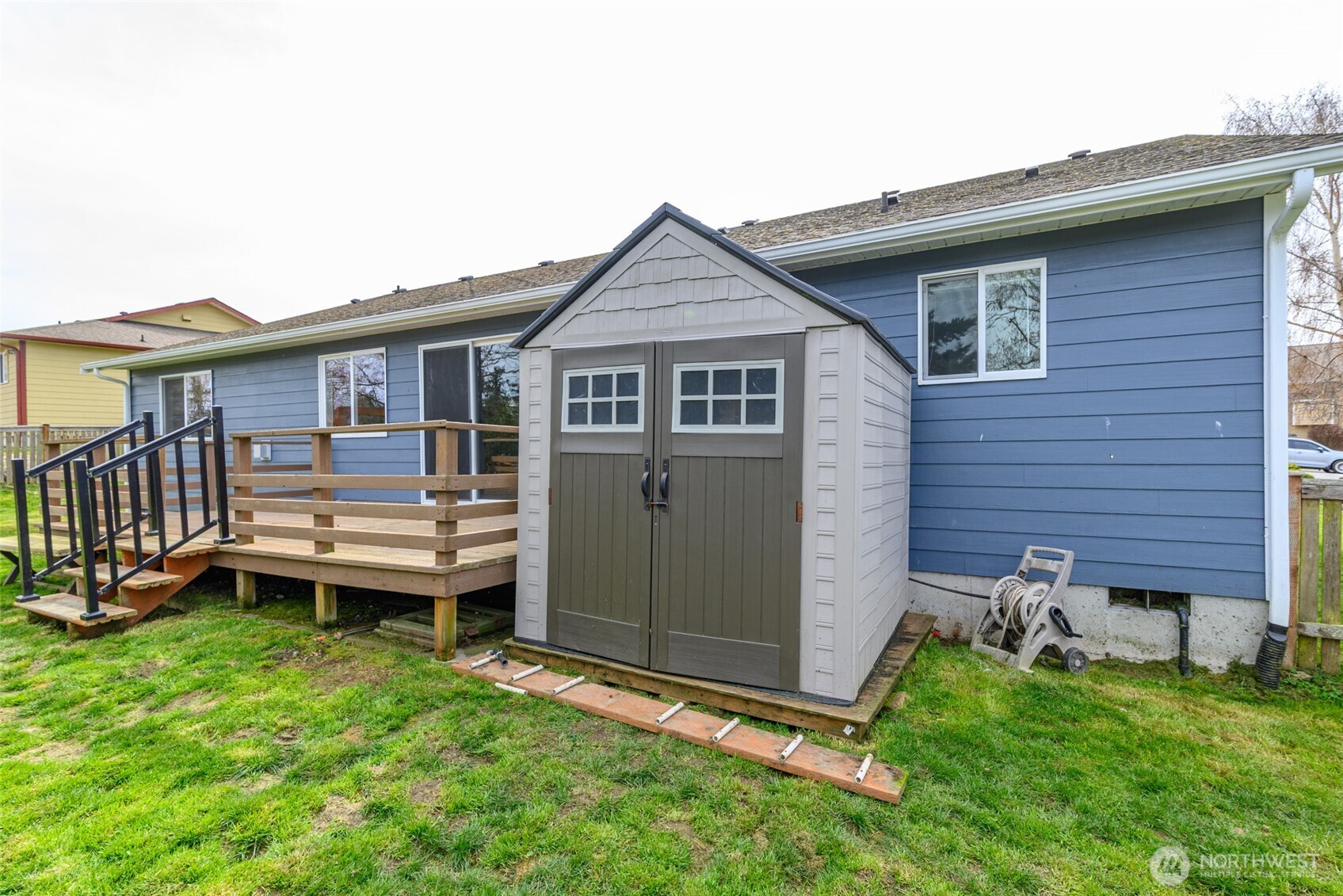 2060 Southwest 16th Avenue Oak Harbor, WA 98277 - Photo 36 of 40 a view of a house with a backyard and deck