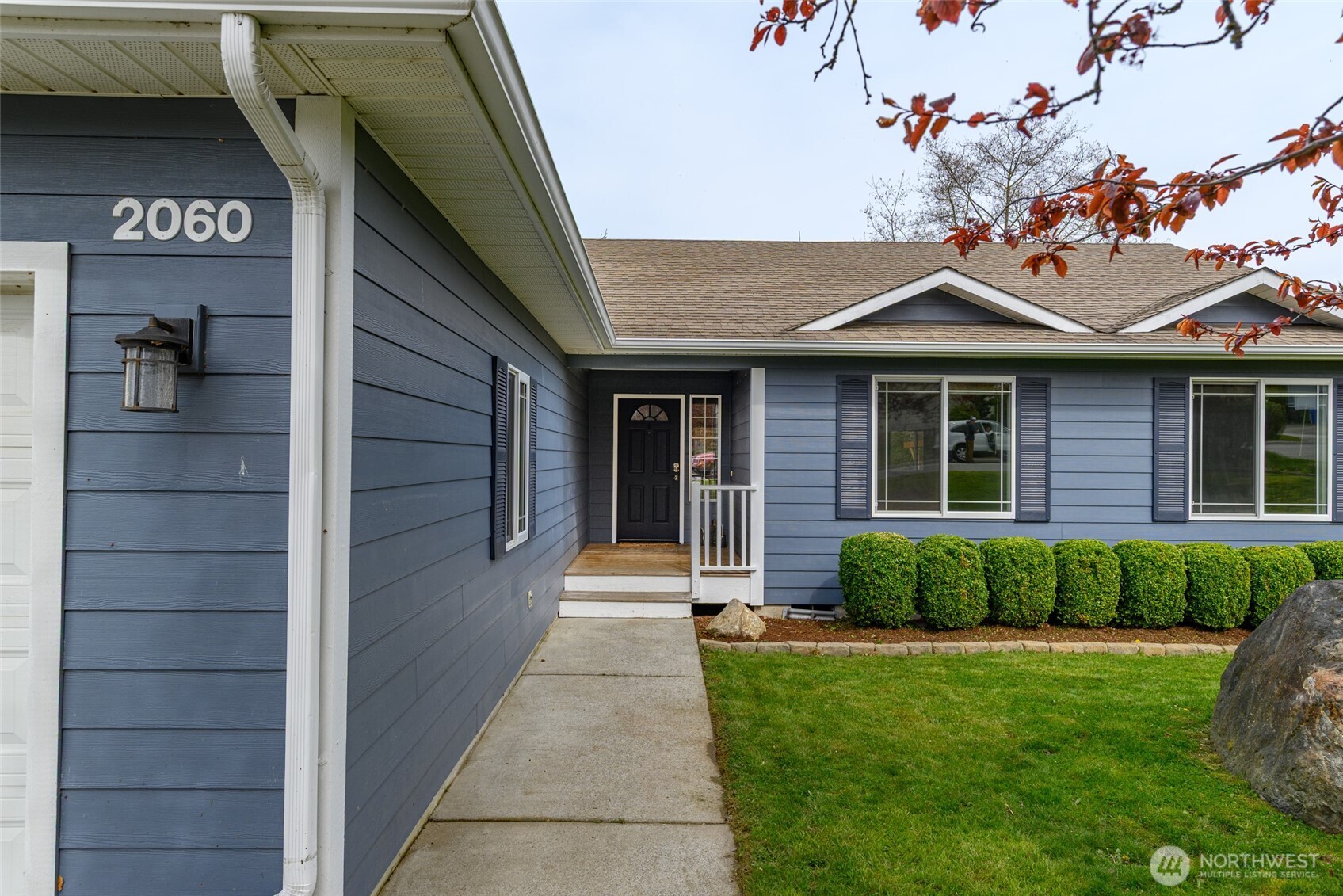 2060 Southwest 16th Avenue Oak Harbor, WA 98277 - Photo 37 of 40 a front view of a house with a garden