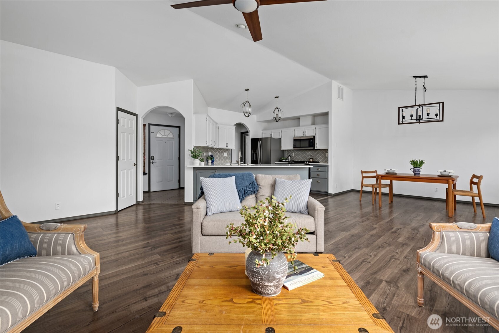 2060 Southwest 16th Avenue Oak Harbor, WA 98277 - Photo 6 of 40 a living room with fireplace furniture and a wooden floor