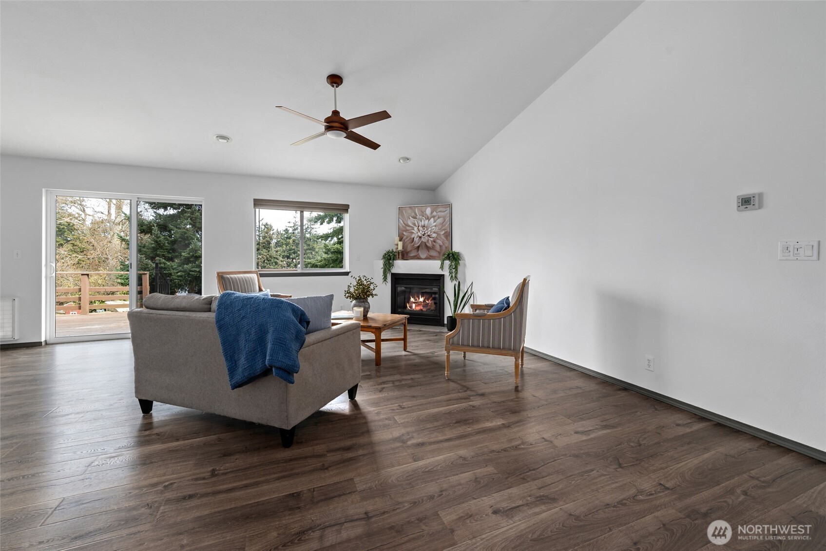 2060 Southwest 16th Avenue Oak Harbor, WA 98277 - Photo 7 of 40 a living room with furniture fireplace and window