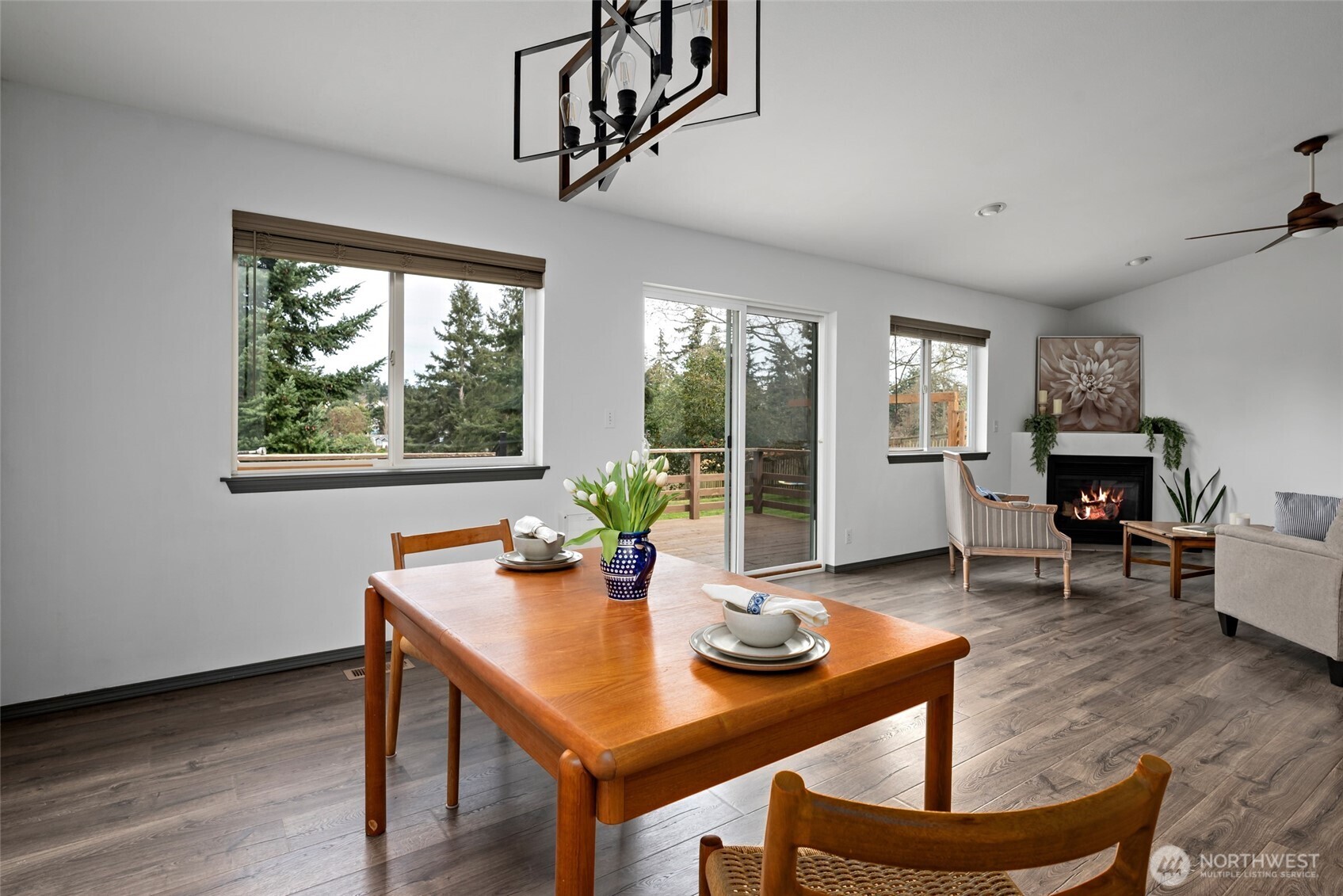 2060 Southwest 16th Avenue Oak Harbor, WA 98277 - Photo 8 of 40 a view of a dining room with furniture window and wooden floor