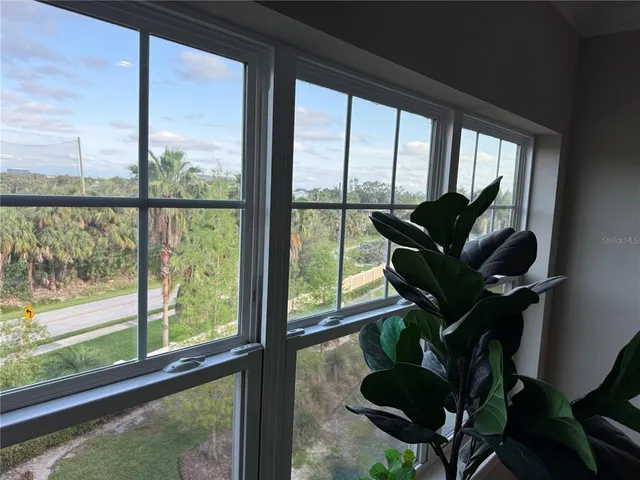 a view of a porch with furniture
