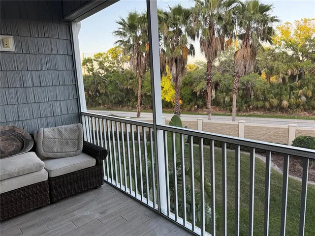 a bathroom with a granite countertop sink a mirror and a shower