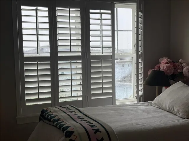 a view of a glass door and a window