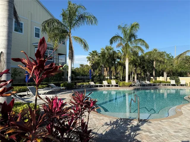 a view of outdoor space with palm trees