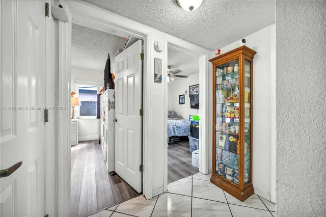 a bathroom with a tub and shower view