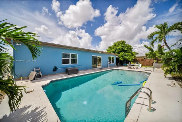 a house view with a seating space and garden