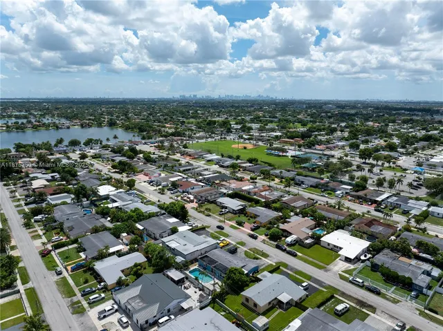 an aerial view of a city with lots of residential buildings
