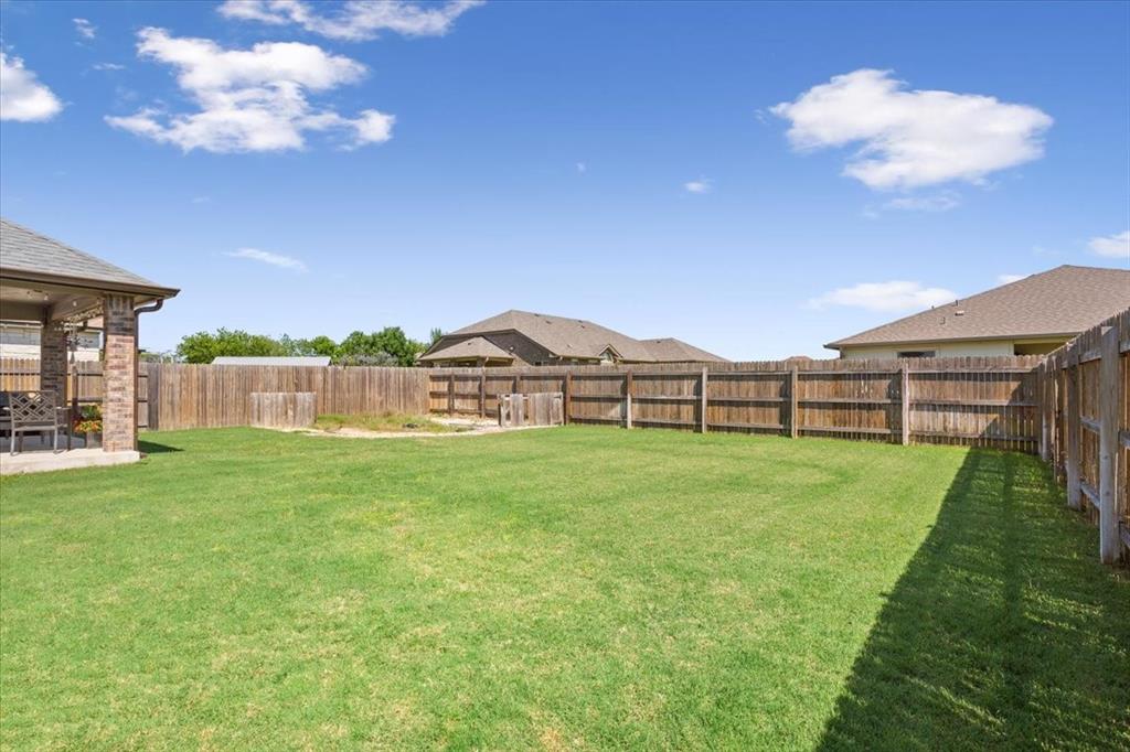 5308 Tama Drive Waco, TX 76708 - Photo 28 of 29 a view of a house with a backyard