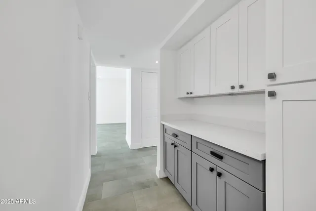 a view of cabinets with wooden floor