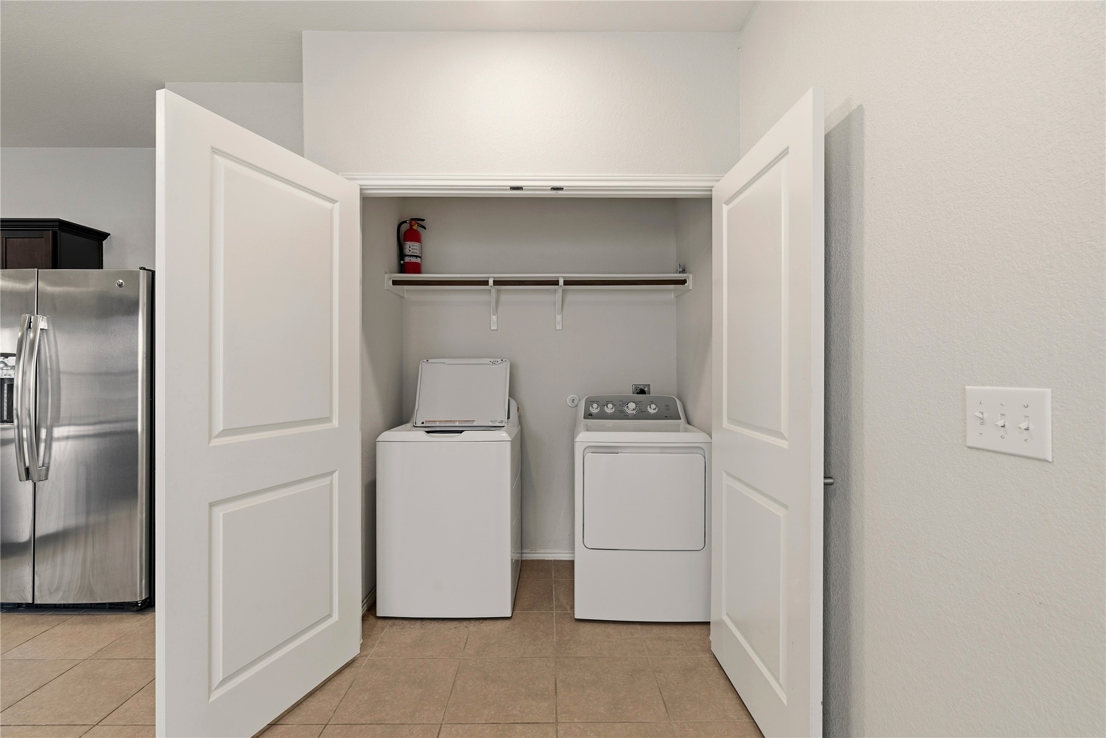 3721 Alpine Autumn Drive Austin, TX 78744 - Photo 14 of 29 a utility room with dryer and washer