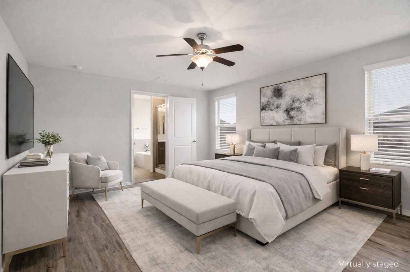 3721 Alpine Autumn Drive Austin, TX 78744 - Photo 16 of 29 a spacious bedroom with a bed and ceiling fan