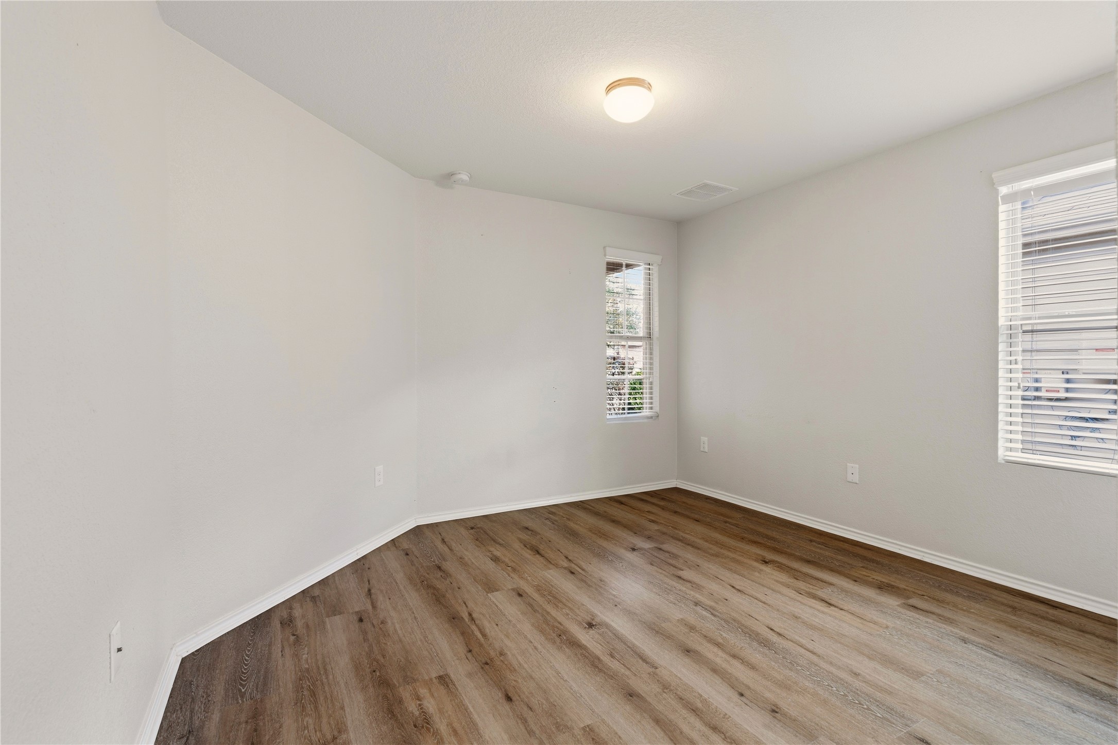 3721 Alpine Autumn Drive Austin, TX 78744 - Photo 25 of 29 an empty room with a window