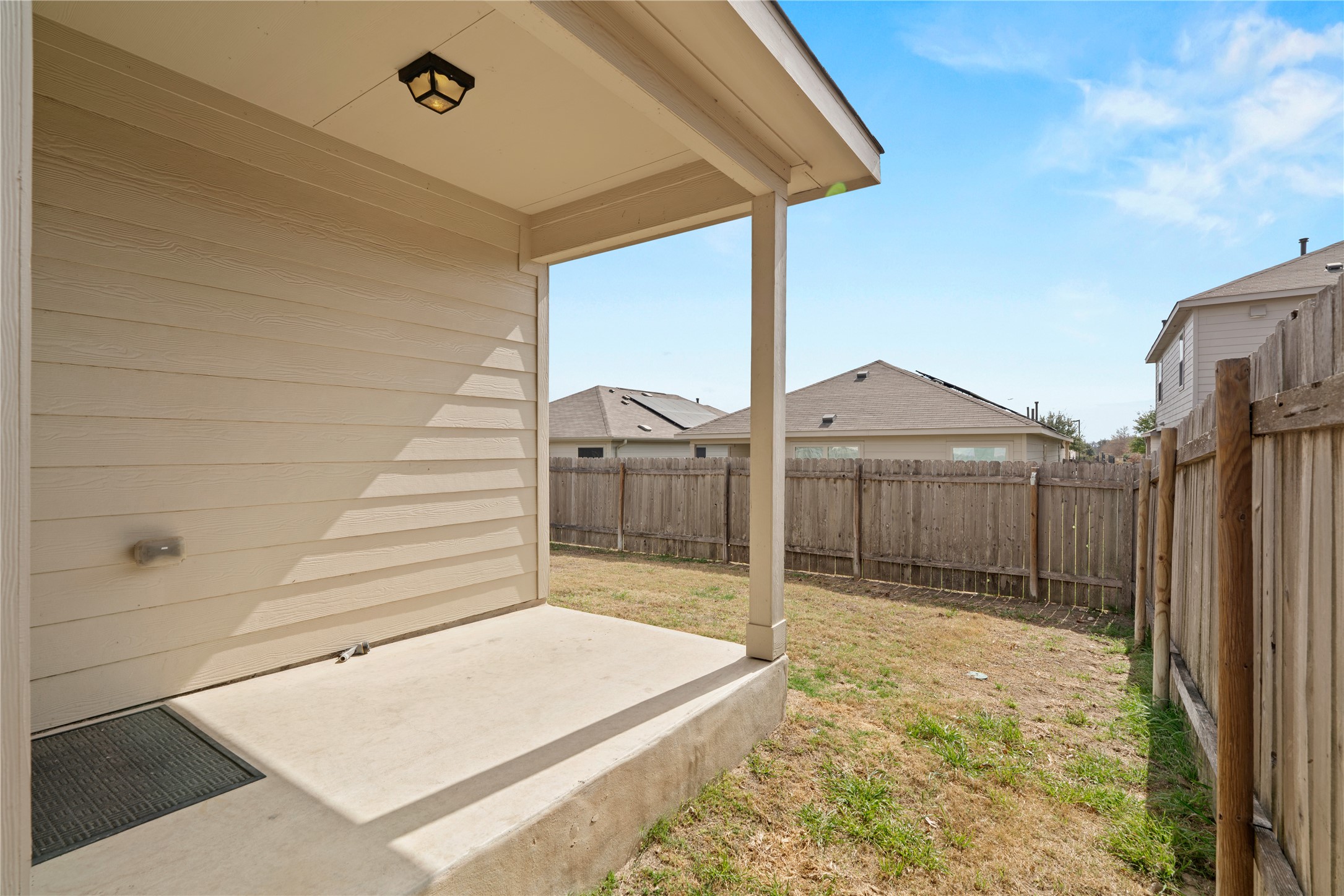 3721 Alpine Autumn Drive Austin, TX 78744 - Photo 27 of 29 a view of backyard with tub