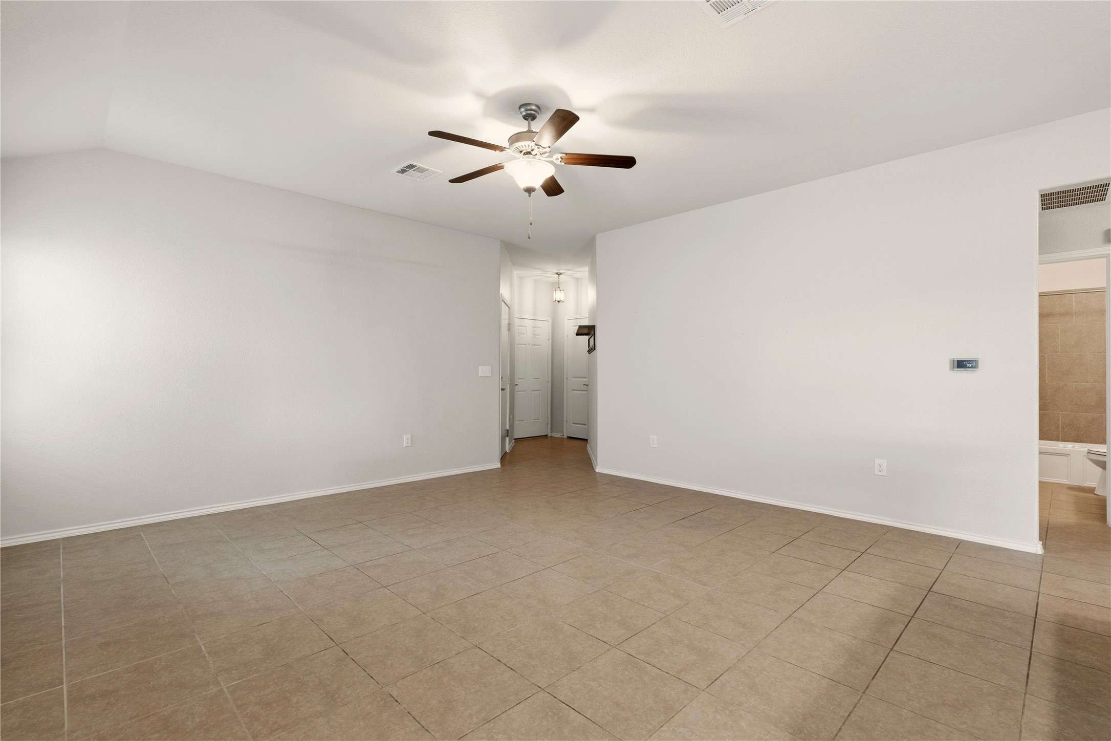 3721 Alpine Autumn Drive Austin, TX 78744 - Photo 8 of 29 wooden floor in an empty room