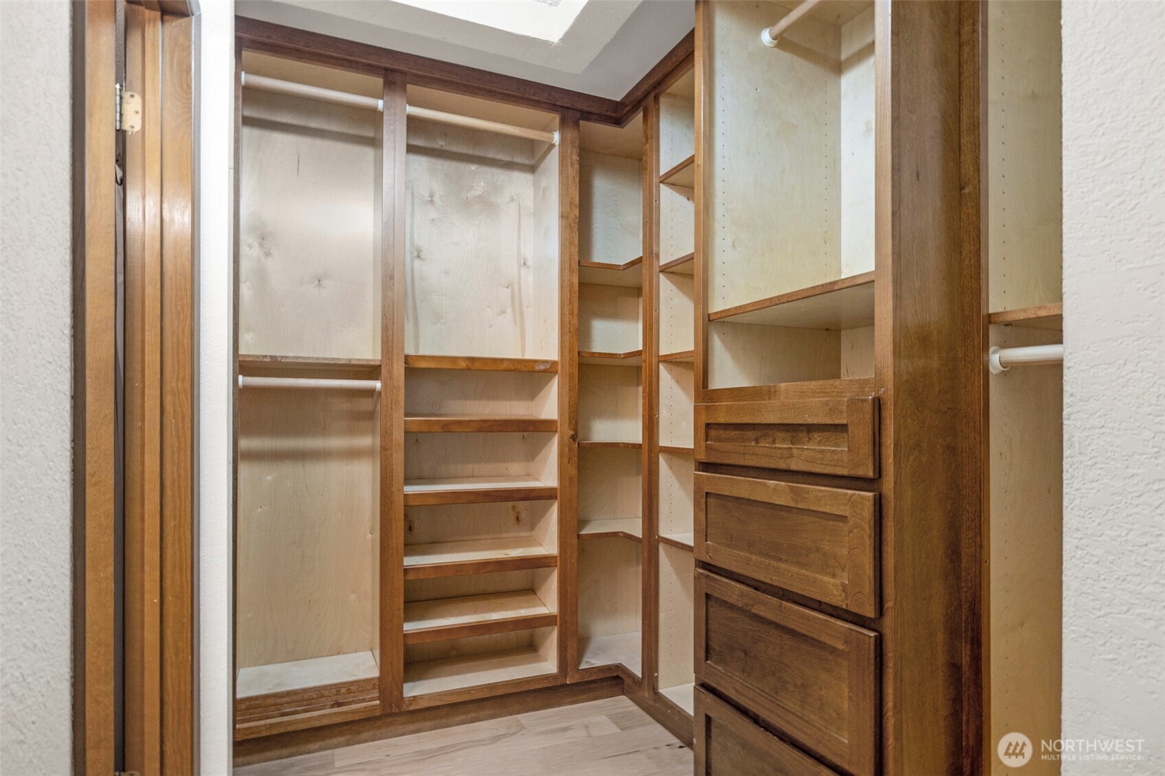 200 James Street, Unit 307 Edmonds, WA 98020 - Photo 12 of 37 a view of walk in closet with empty racks