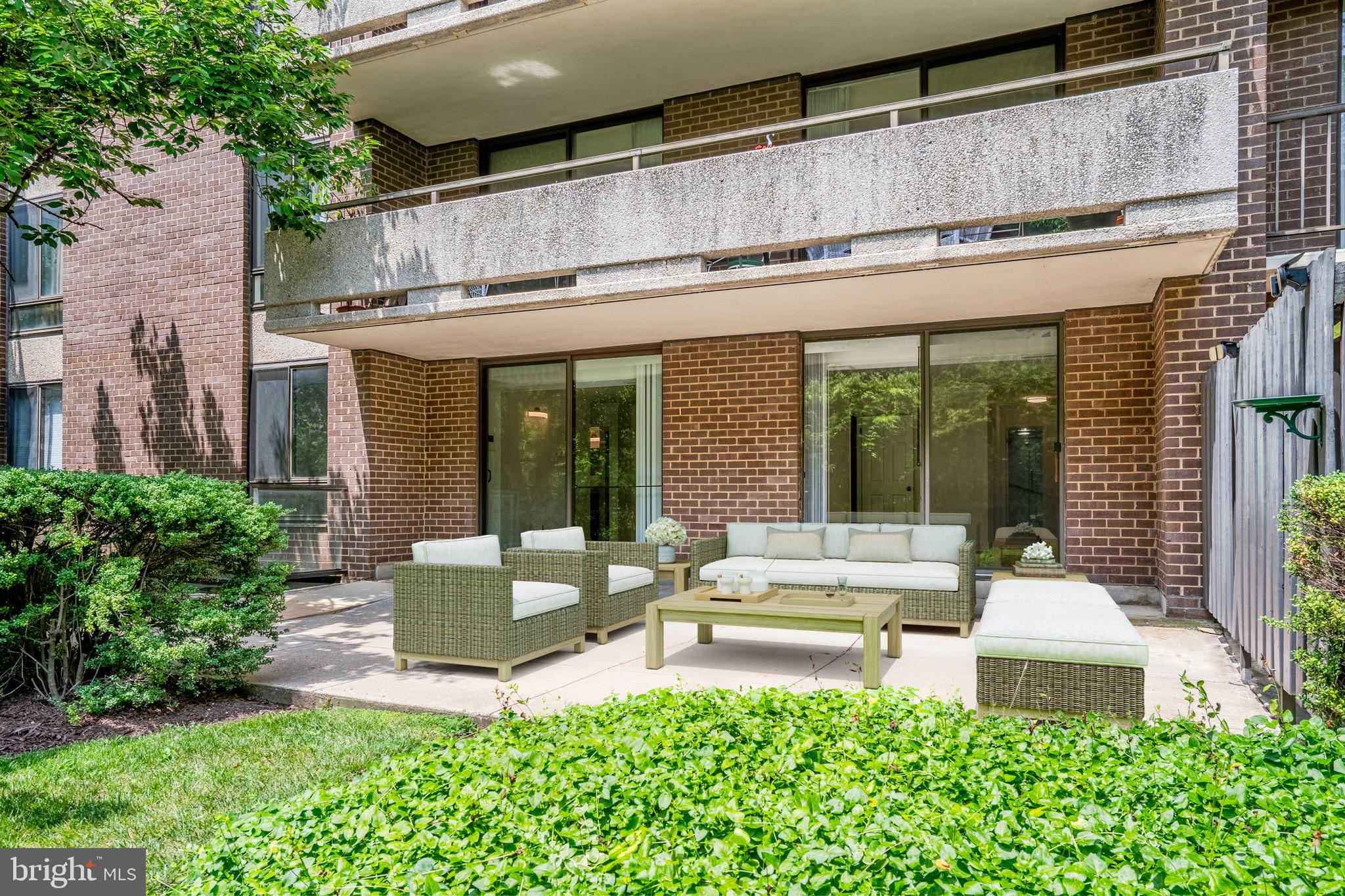 1800 Old Meadow Road, Unit 218 McLean, VA 22102 - Photo 24 of 57 Relax, enjoy the semi private patio
