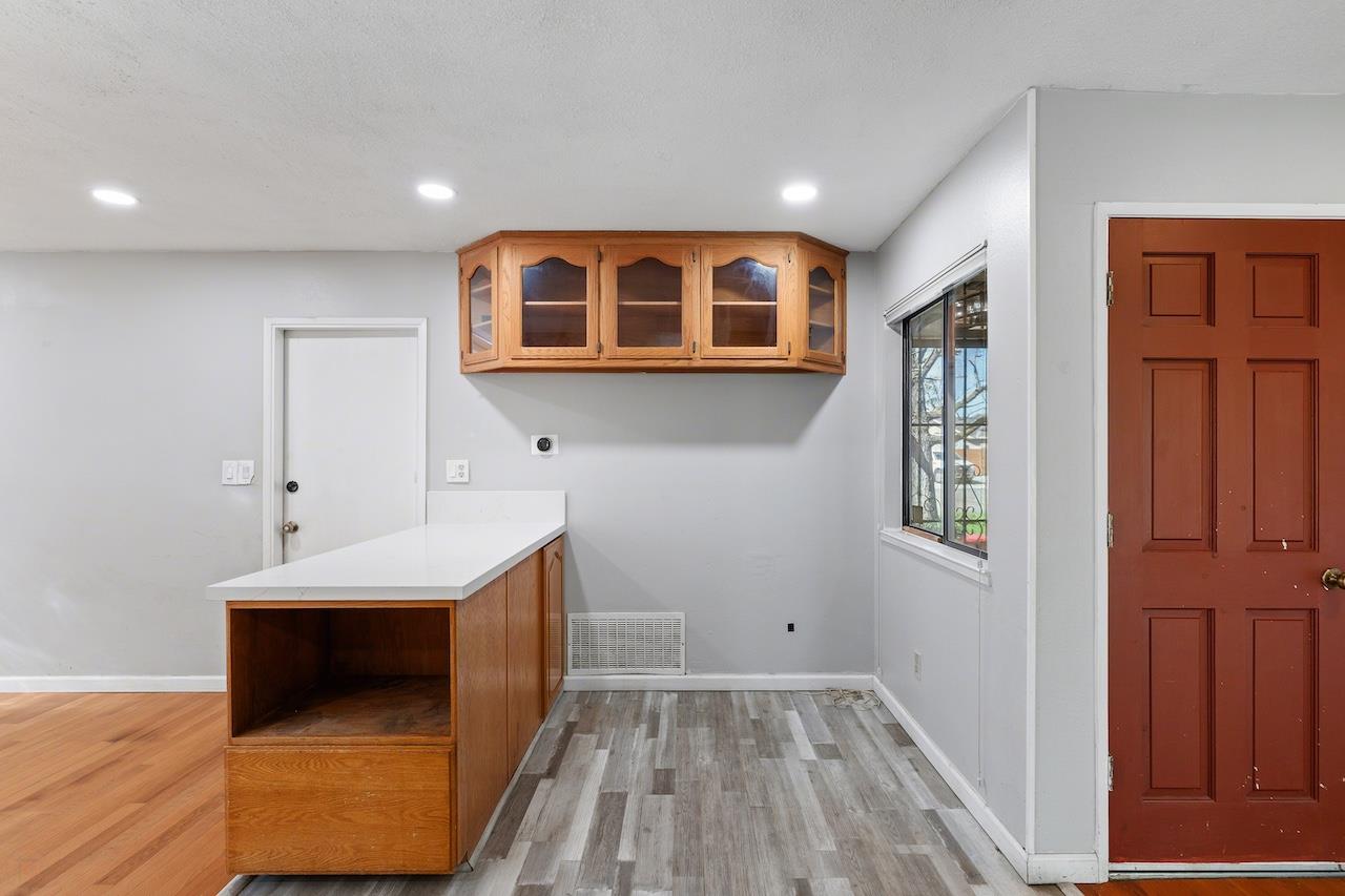 1460 Ridgecrest Drive Manteca, CA 95336 - Photo 15 of 54 a living room with a bed furniture and a window