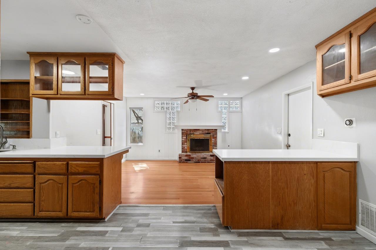 1460 Ridgecrest Drive Manteca, CA 95336 - Photo 16 of 54 a living room with furniture and a fireplace