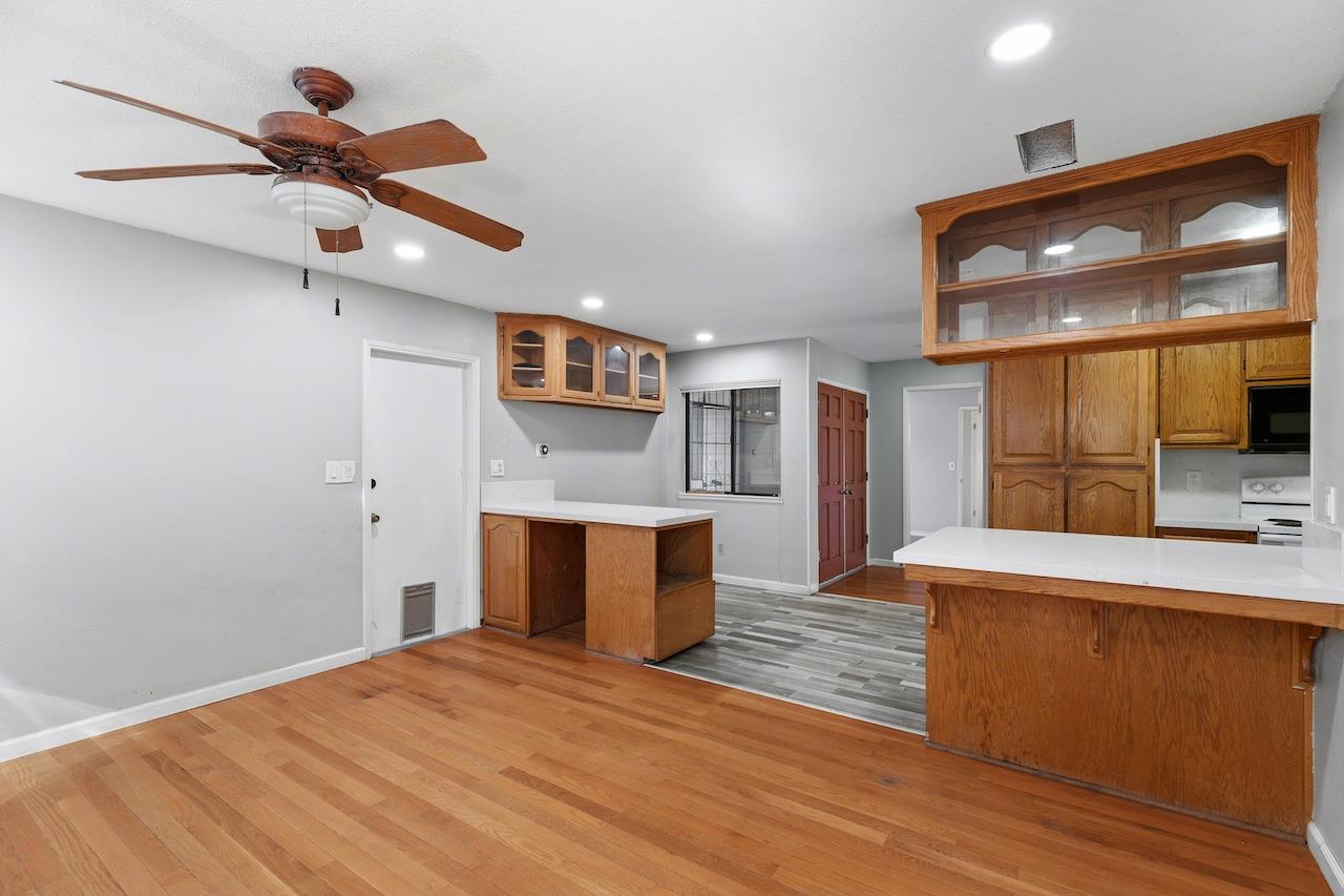 1460 Ridgecrest Drive Manteca, CA 95336 - Photo 23 of 54 a bedroom with a bed and a large mirror on the dresser