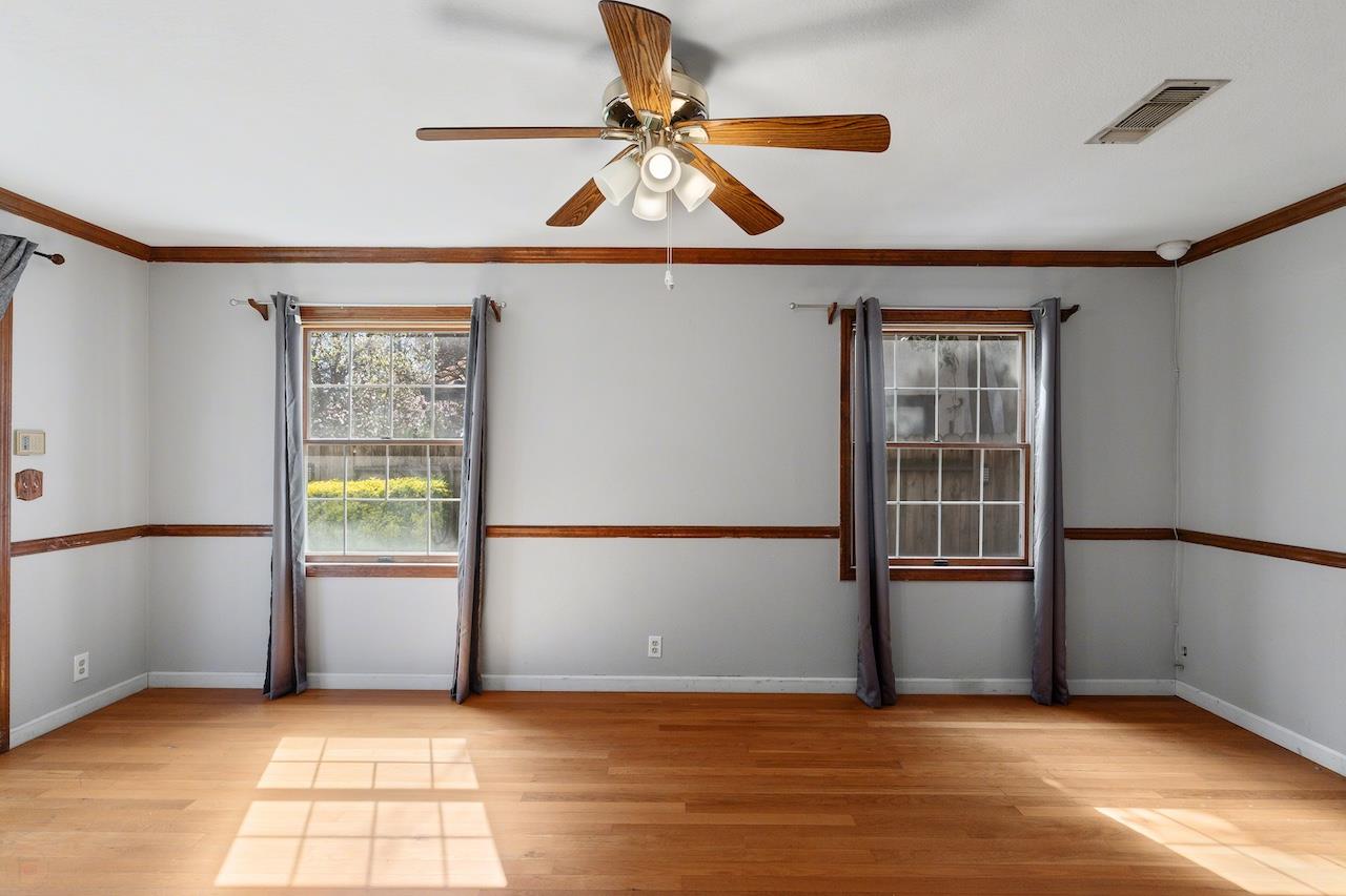 1460 Ridgecrest Drive Manteca, CA 95336 - Photo 25 of 54 an empty room with windows