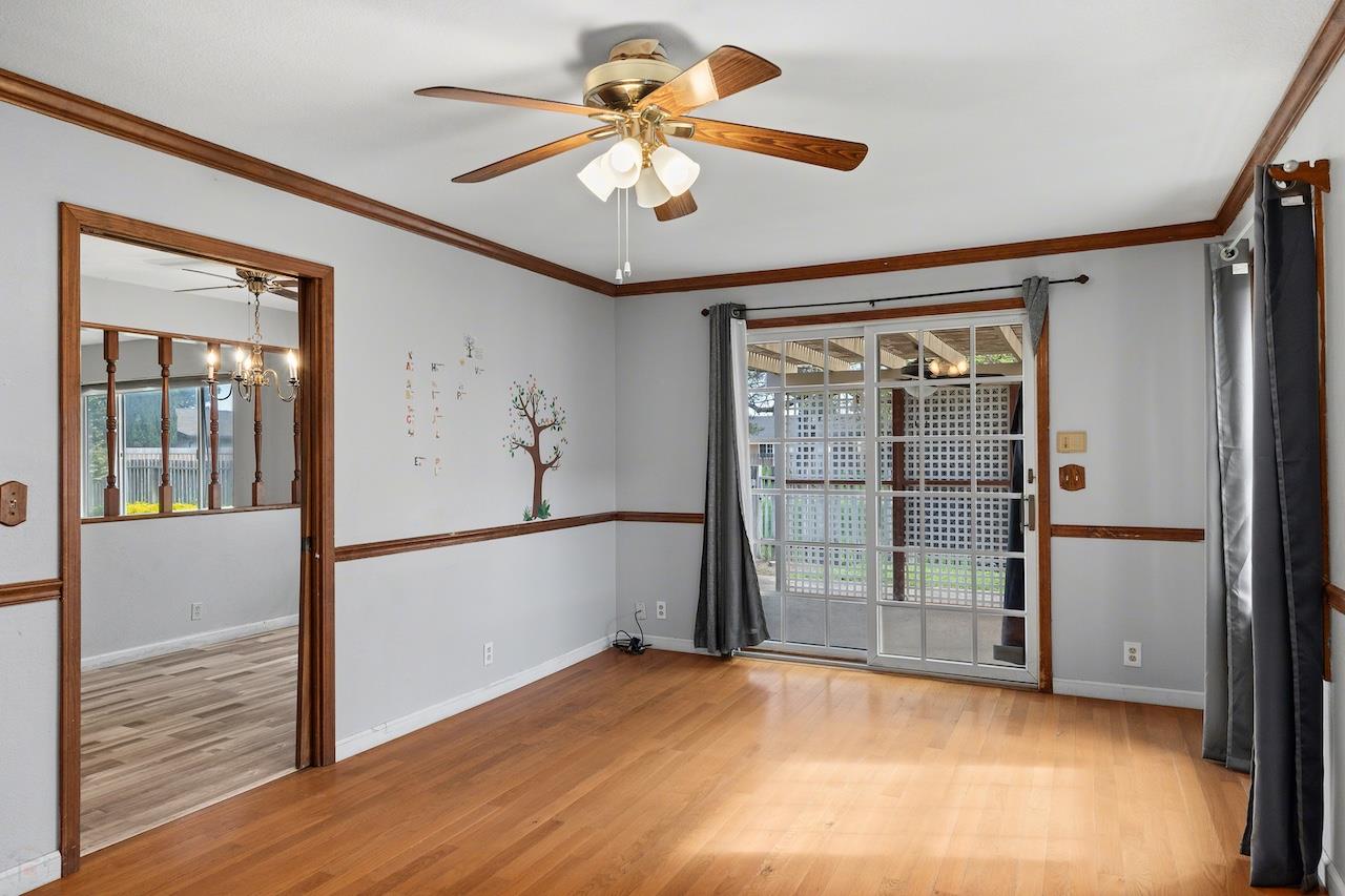 1460 Ridgecrest Drive Manteca, CA 95336 - Photo 28 of 54 a view of empty room with wooden floor and fan