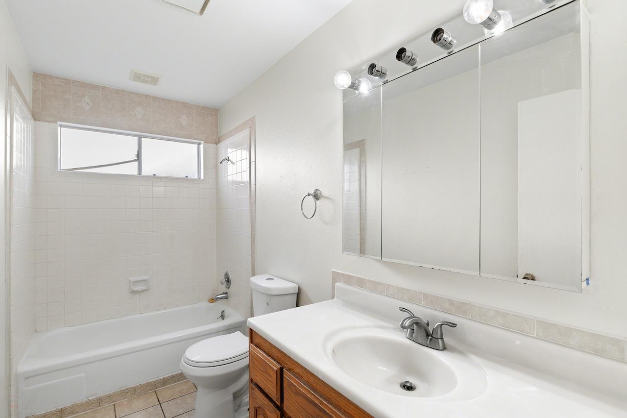 1460 Ridgecrest Drive Manteca, CA 95336 - Photo 37 of 54 a bathroom with a sink toilet and shower