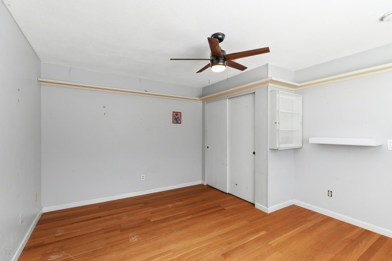 1460 Ridgecrest Drive Manteca, CA 95336 - Photo 39 of 54 a view of empty room with wooden floor