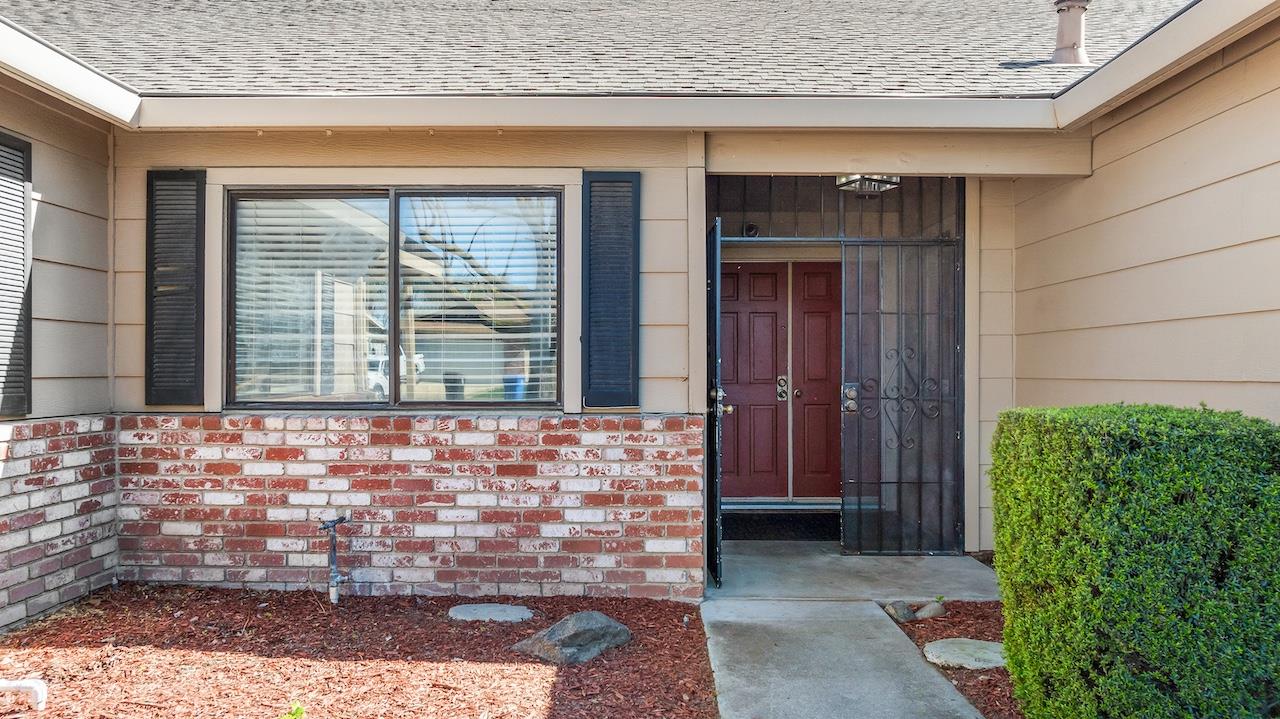 1460 Ridgecrest Drive Manteca, CA 95336 - Photo 5 of 54 a view of front door of house