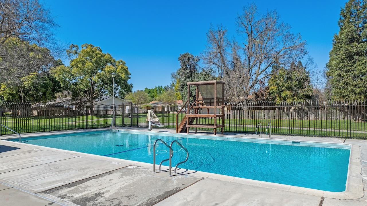 1460 Ridgecrest Drive Manteca, CA 95336 - Photo 51 of 54 a view of a swimming pool and a yard