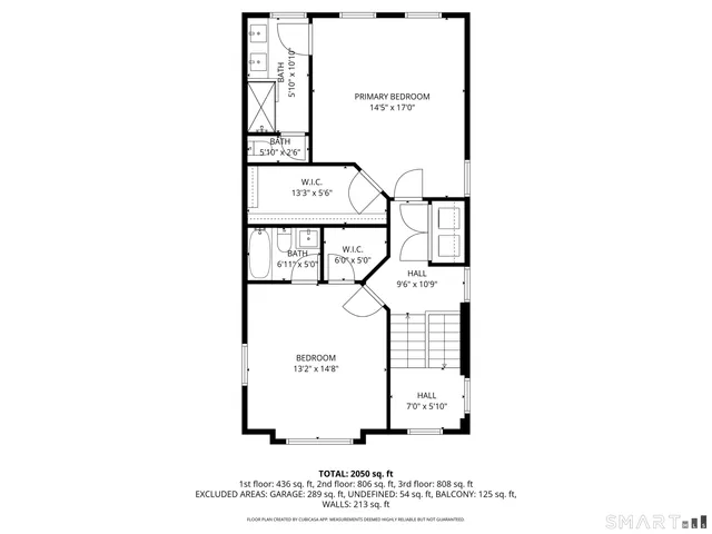 a wooden bench sitting in front of a window