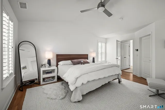a view of entryway with wooden floor