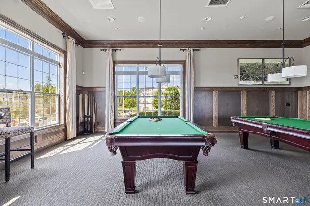 a view of a patio with swimming pool