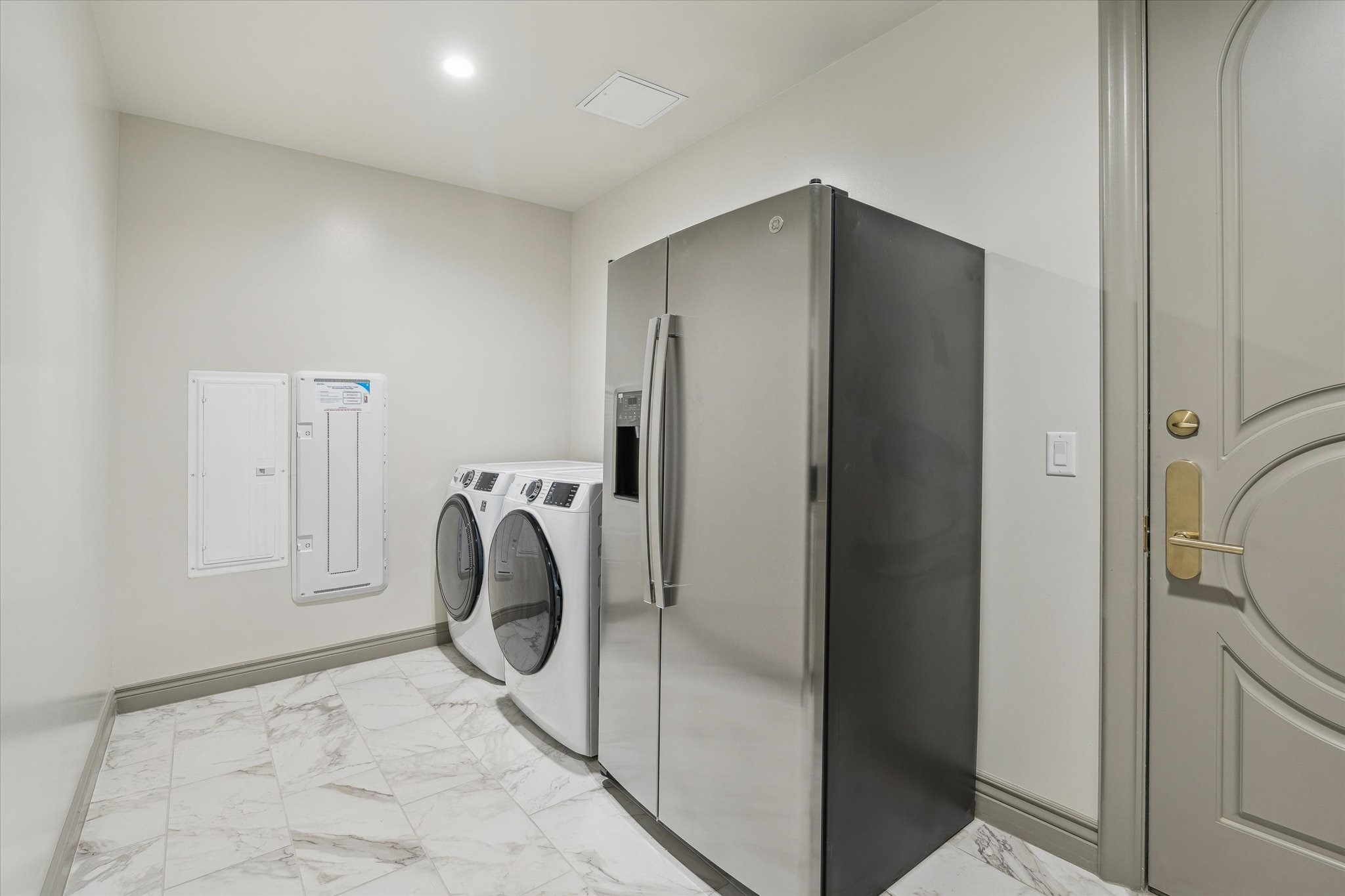 1717 Bissonnet Street, Unit 605 Houston, TX 77005 - Photo 11 of 32 Service kitchen with second refrigerator, full size washer and dryer, service entrance.