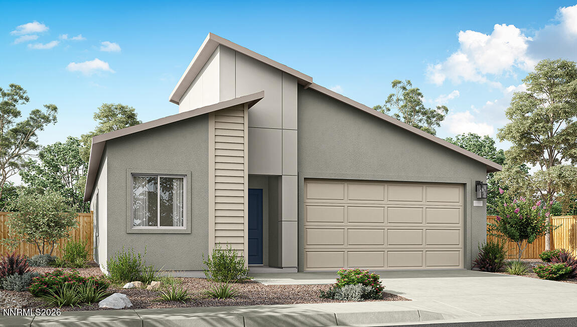 497 Radiant Drive Carson City, NV 89705 - Photo 1 of 23 a front view of a house with a yard