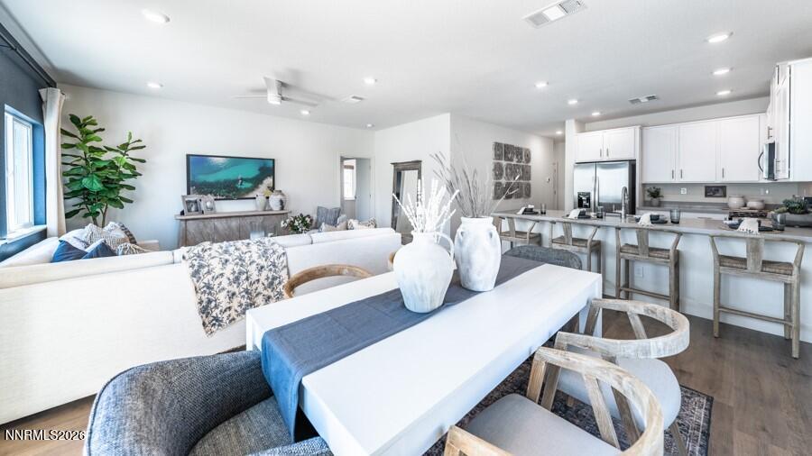497 Radiant Drive Carson City, NV 89705 - Photo 11 of 23 a living room with furniture kitchen view and a large window