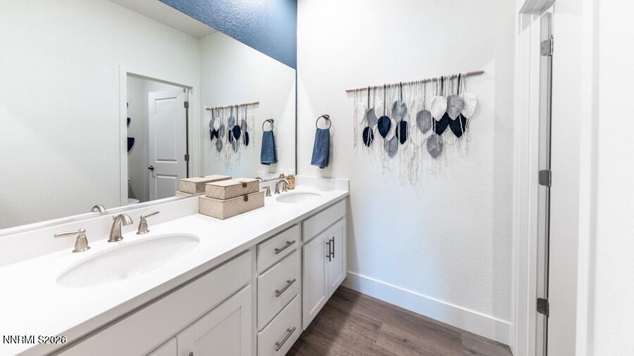 497 Radiant Drive Carson City, NV 89705 - Photo 22 of 23 a bathroom with a double vanity sink mirror and shower