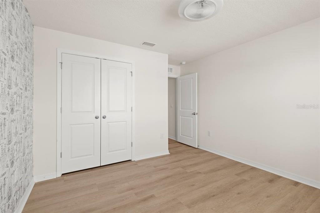 7782 Sail Clover Lane Zephyrhills, FL 33540 - Photo 13 of 22 a view of an empty room