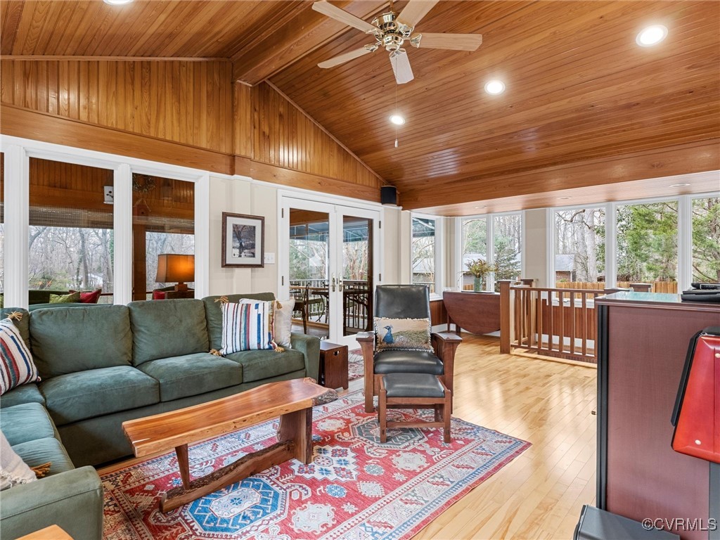 8654 Fieldcrest Road Richmond, VA 23235 - Photo 11 of 48 a living room with furniture and a floor to ceiling window
