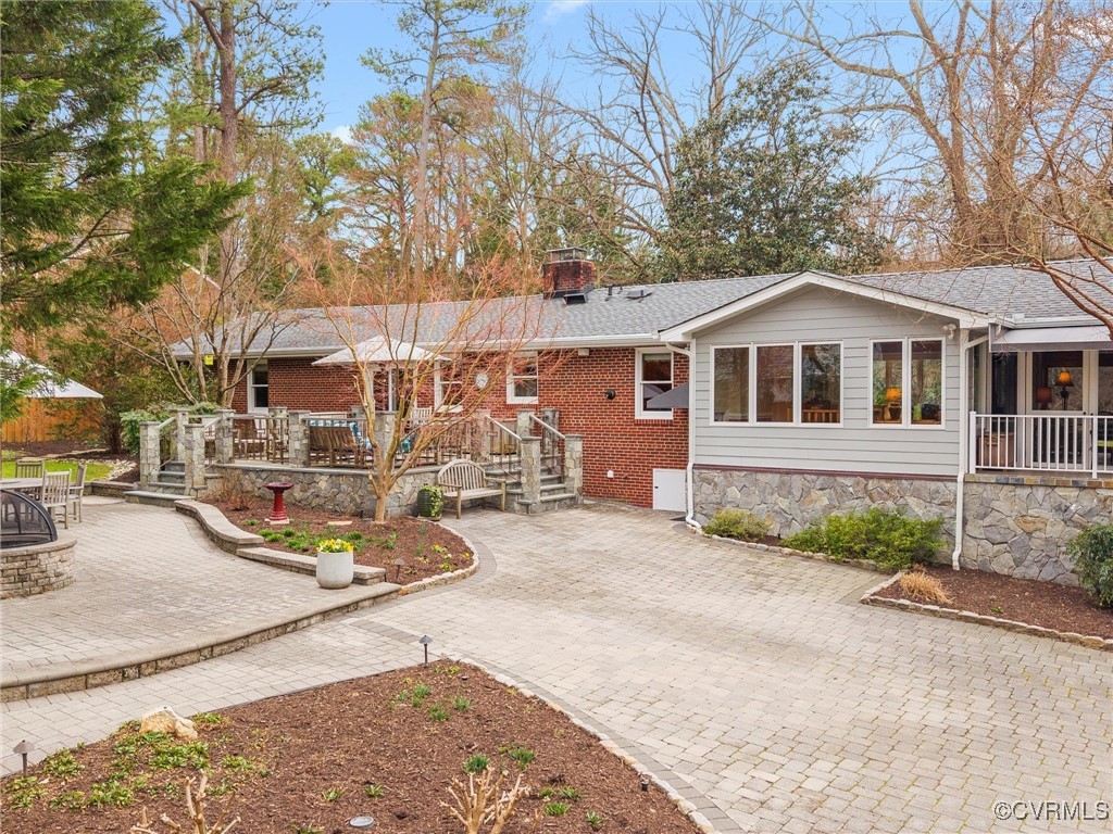 8654 Fieldcrest Road Richmond, VA 23235 - Photo 43 of 48 front view of a house with a patio