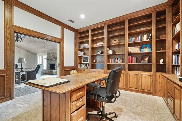 a view of a workspace with furniture