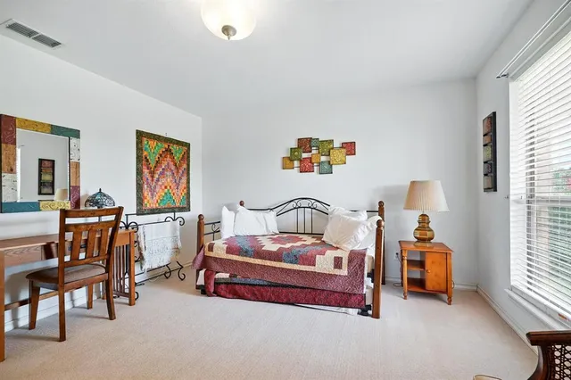 a room with furniture and a window