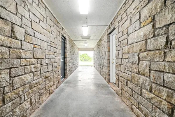 a view of a pathway with a bench