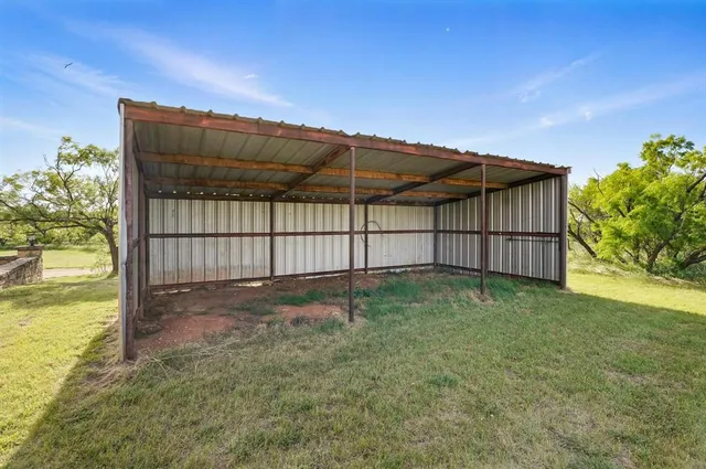 a view of backyard and pathway