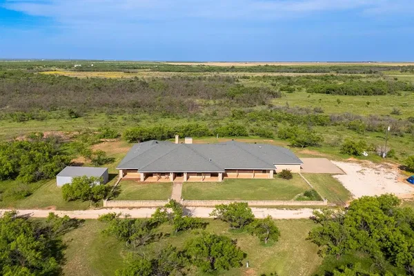 a view of a house with a ocean view