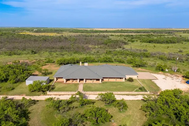 a view of a house with a ocean view