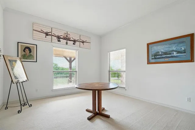 a room with gym equipment and a window