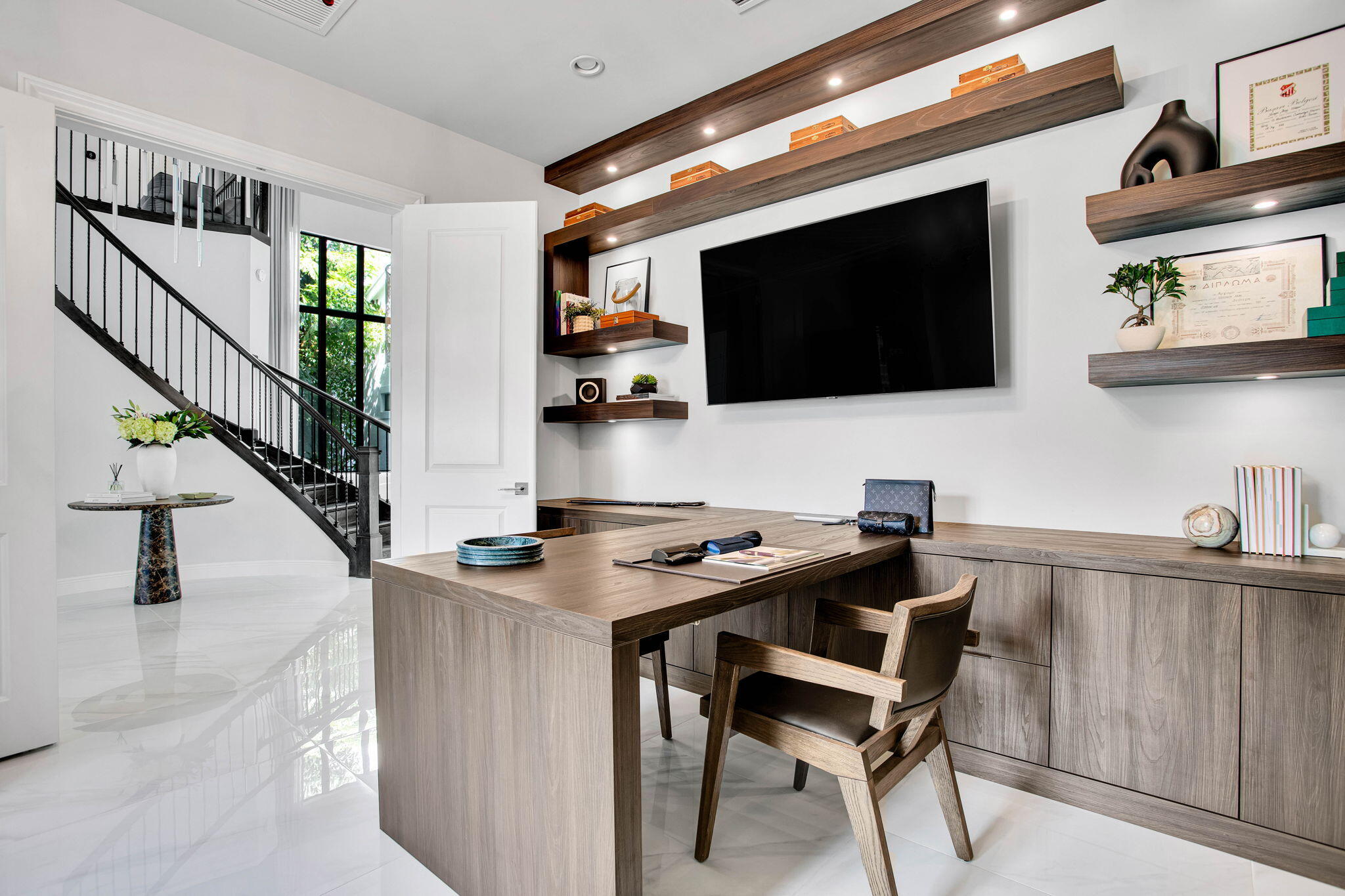 6903 Northwest 28th Avenue Boca Raton, FL 33496 - Photo 32 of 69 a table and chairs in a kitchen