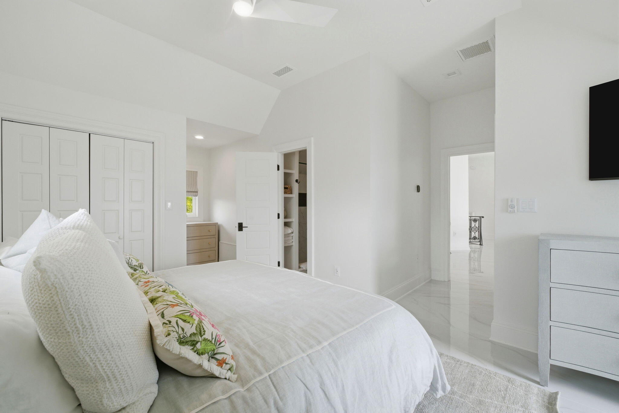 31061 Peninsula Drive Orange Beach, AL 36561 - Photo 13 of 93 a bedroom with a bed and a flat screen tv