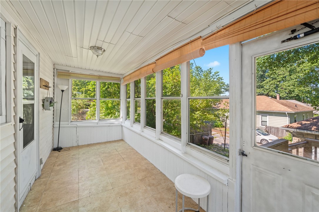 323 Maple Street Woonsocket, RI 02895 - Photo 24 of 40 enclose porch located at the back of the house off the kitchen